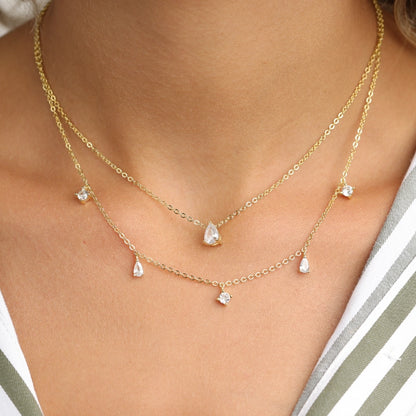 שרשרת כסף  2 שורות , שורה אחת עם תליוני טיפות קטנים שורה שניה עם תליון טיפה